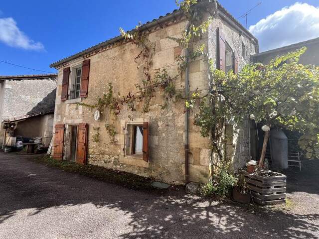 Maison en pierre de 5 pièces principales — photo du bien