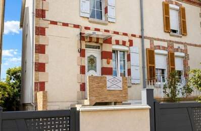 MAISON DE VILLE AVEC JARDIN — photo du bien