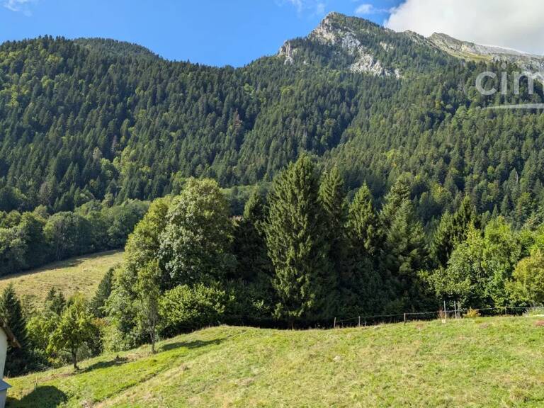 Terrin de 1910 m2 constructible avec magnifique vue montagnes — photo 1