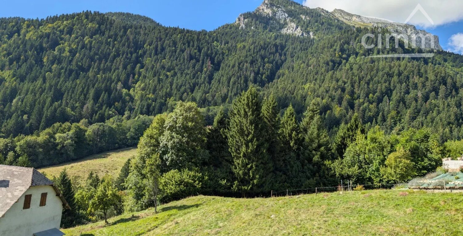 Terrin de 1910 m2 constructible avec magnifique vue montagnes — photo 1
