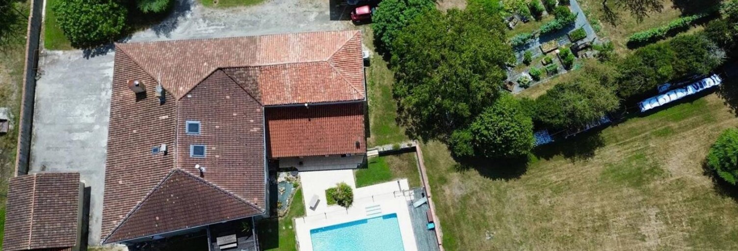 Maison 11 Pièces 400 m² à vendre à Saint-Jean-le-Comtal (32550)