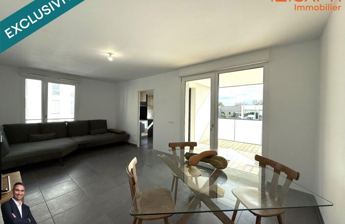 Superbe appartement de 3 pièces disposant d'une terrasse et d'une place de stationnement privée ! — photo 2