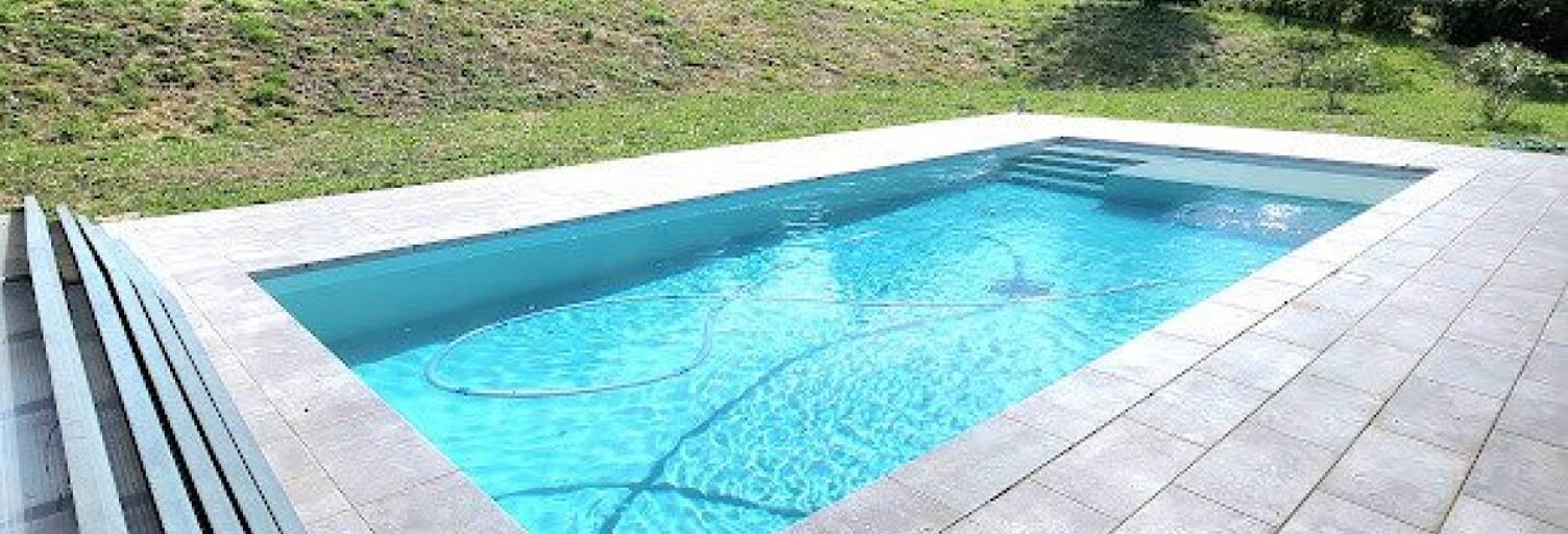 Maison 7 Pièces 207 m² à vendre à Châteauneuf (42800)