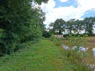 Grange , maisonnette, en pierre, brute à rénover, sur terrain de 10 000 m2 avec étang et Mobil Home. Proche Villaines la Juhel, Pré en Pail , Mayenne — photo 4