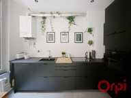 APPARTEMENT STANDING VICHY T4 - BALCONS - COEUR DE VILLE - MOULURES - HAUTEUR SOUS PLAFONs — photo 4