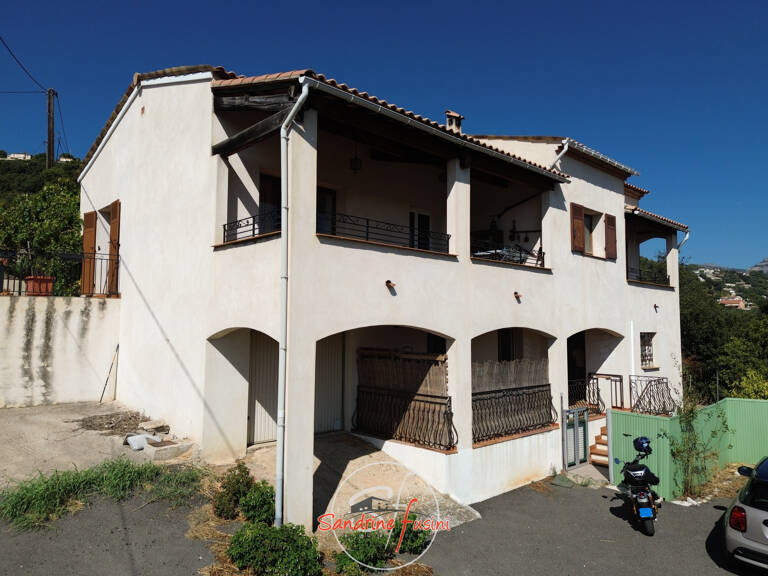 MAISON INDIVIDUELLE COMPOSEE DE DEUX APPARTEMENTS AVEC GARAG — photo 1
