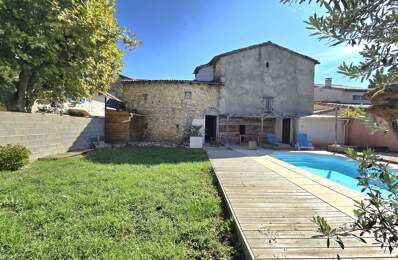 A vendre maison de village 6 pièces, 130m² avec jardin et pisc — photo du bien