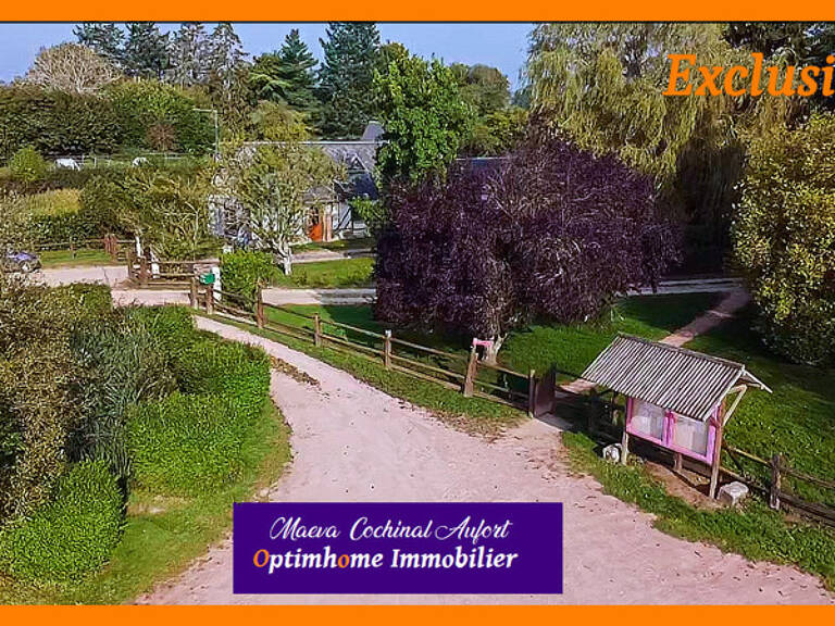 Ecurie avec 3 maisons sur 4 hectares proposant de nombreuses installations (boxes, manèges, carrières) dans l'Eure à 15min de L'Aigle — photo 1
