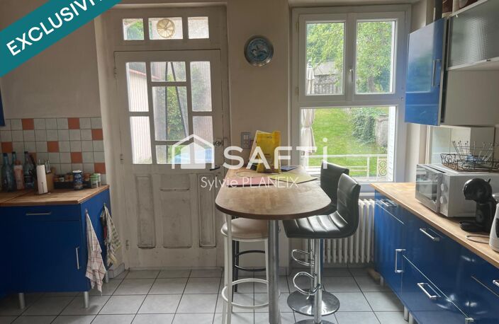 À découvrir cet Immeuble avec local commercial en rdc et 2 appartements sur 3 étages. — photo 5