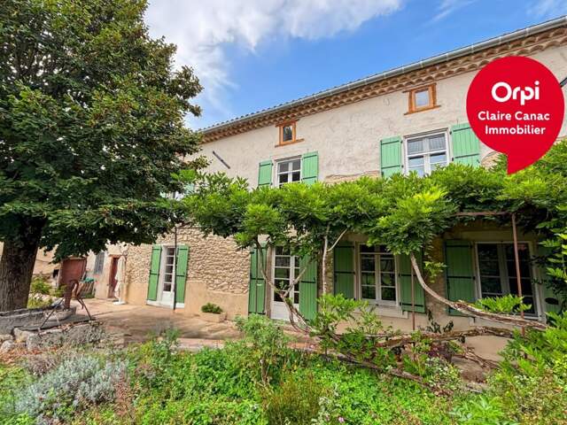 Maison de village à vendre avec garage et jardin — photo du bien