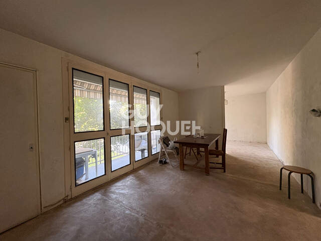 Spacieux T5 à rénover de 105,51 m² avec balcons et cave — photo du bien