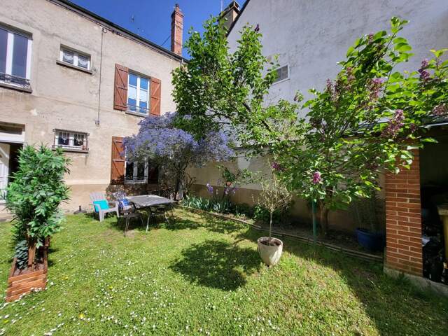 Appartement 4 pièces avec jardin — photo du bien