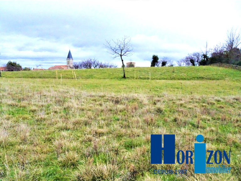 EXCLUSIVITE: LEZIGNEUX CENTRE TERRAIN PLAT — photo 1