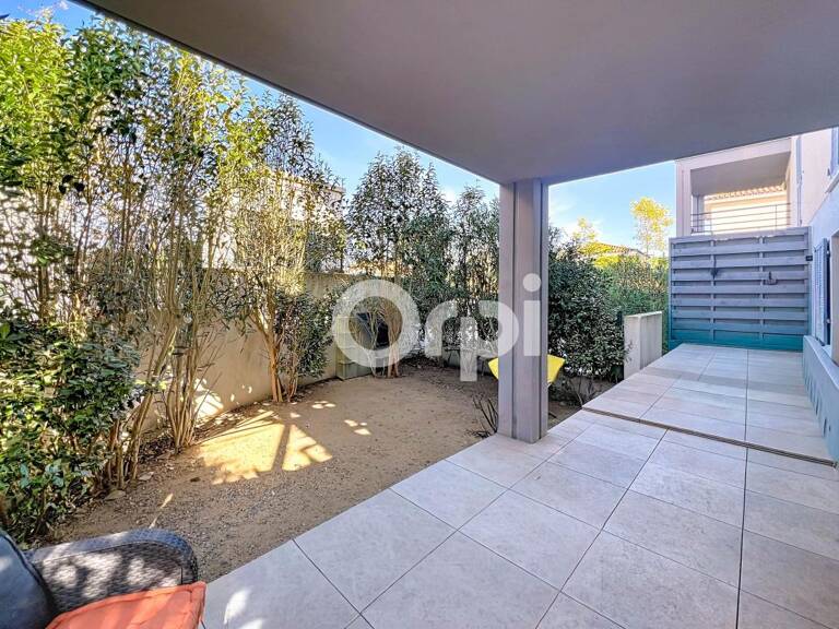 3 Pièces de 57 m²  avec 2 places de parking en sous-sol à Roquebrune-sur-Argens 83520  · Quartier Golf — photo 1