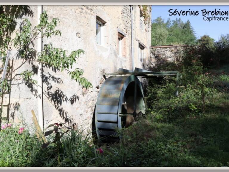   Maison rénovée en pierre de 166 m², 4 chambres, vaste séjour, dépendance, assainissement OK, avec ancien moulin et terrain de 1,8 hectare à Saint-Rémy-sur-Durolle — photo 1