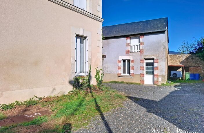 IMMEUBLE 5 LOGEMENTS ET UNE MAISON 72300 LA CHAPELLE D ALIGNE — photo 2