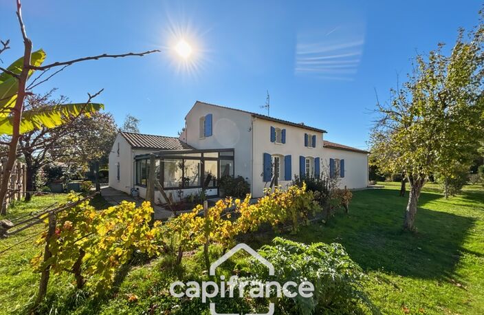 Maison 165 m² avec beaux volumes et jardin paysager – Fontaines — photo 4