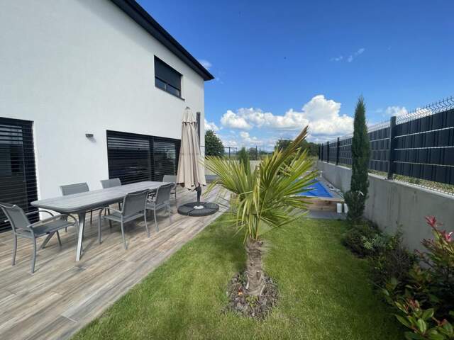 Maison - 115m ² — photo du bien