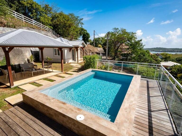 À vendre : CAP EST – LE FRANÇOIS | Villa de prestige avec piscine, bungalow indépendant et vue mer — photo 1