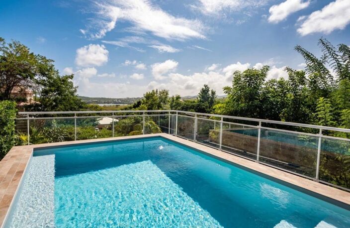 À vendre : CAP EST – LE FRANÇOIS | Villa de prestige avec piscine, bungalow indépendant et vue mer — photo 2