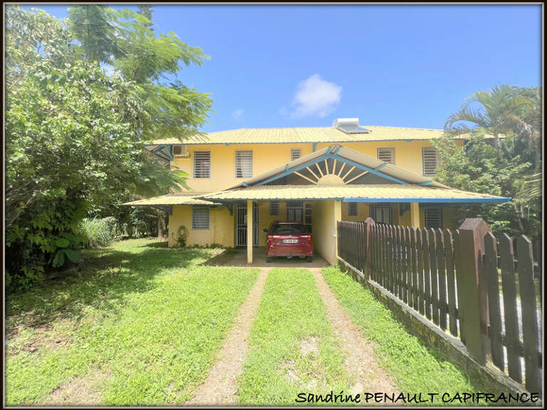 A VENDRE A KOUROU (GUYANE FRANCAISE) UNE JOLIE MAISON JUMELEE T5 (R+1) de 103 m² - SUPERFICIE DU TERRAIN 299 m² AU PRIX DE 185 000 € — photo 1