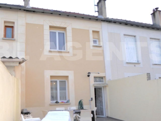 Maison T5   62 m2 sur une parcelle de 86 m2   Terrasse/Jardi — photo du bien