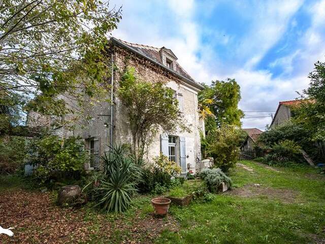 Maison en pierre de 9 pièces principales — photo du bien