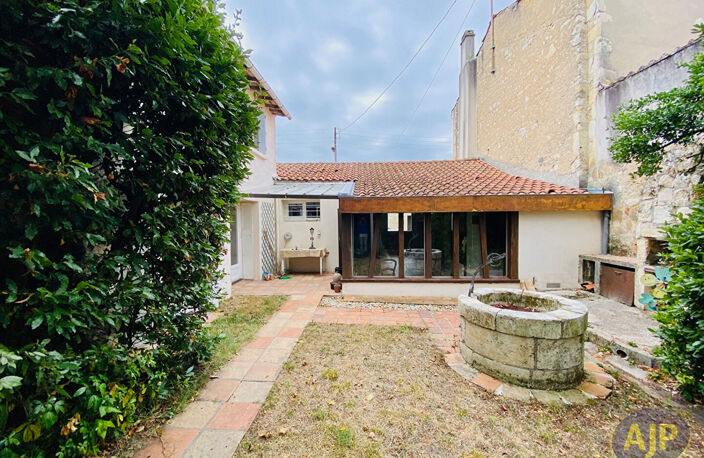 Maison de ville en pierres avec jardinet et garage ! — photo 3