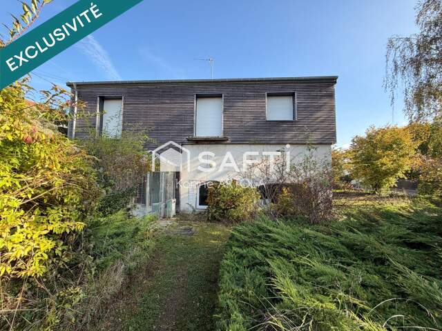 Maison de 181 m² avec studio indépendant, garage et jardin, idéale famille ou activité professionnelle — photo du bien