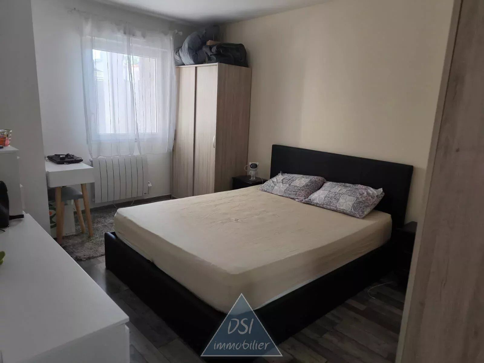 Photo NEYRON Centre - Appartement de type T3 en rez-de-jardin - 51 m² - Terrasse  - Parking image 3/3