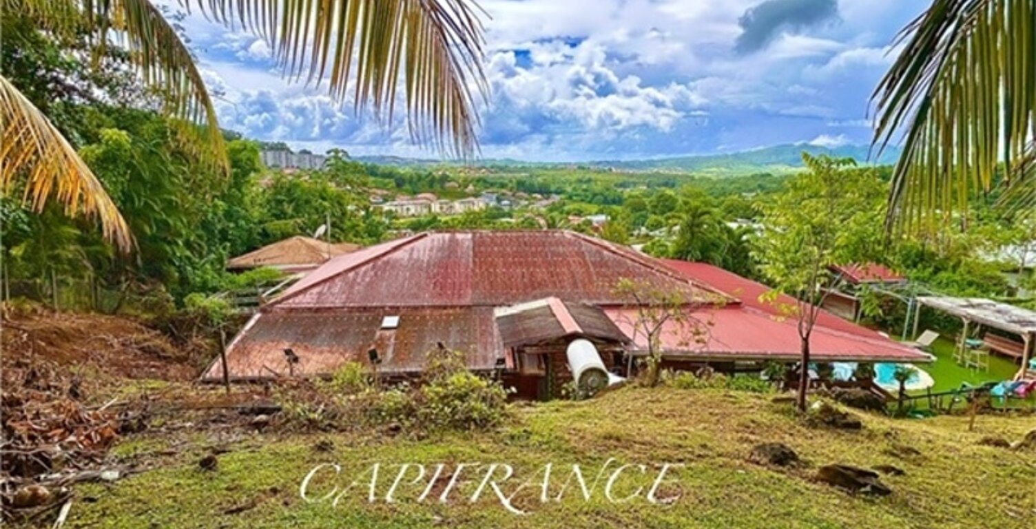  À vendre – Charmante maison avec piscine et studio indépendant à Ducos (97224) — photo 1