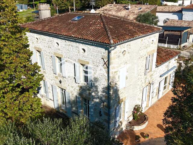 Maison en pierre 8 pièces 284m² — photo du bien