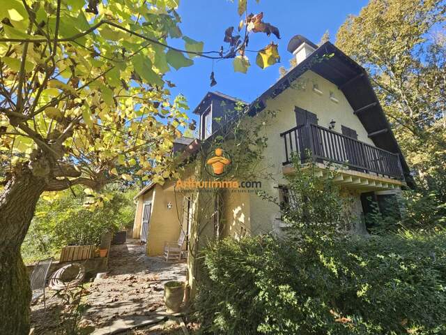 Maison familiale sur grand garage avec 1.7ha de terrain — photo du bien