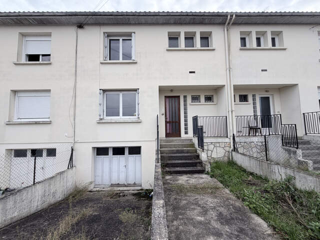 Maison type F4 avec garage et jardin — photo du bien
