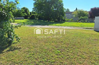 Terrain plat constructible — photo du bien