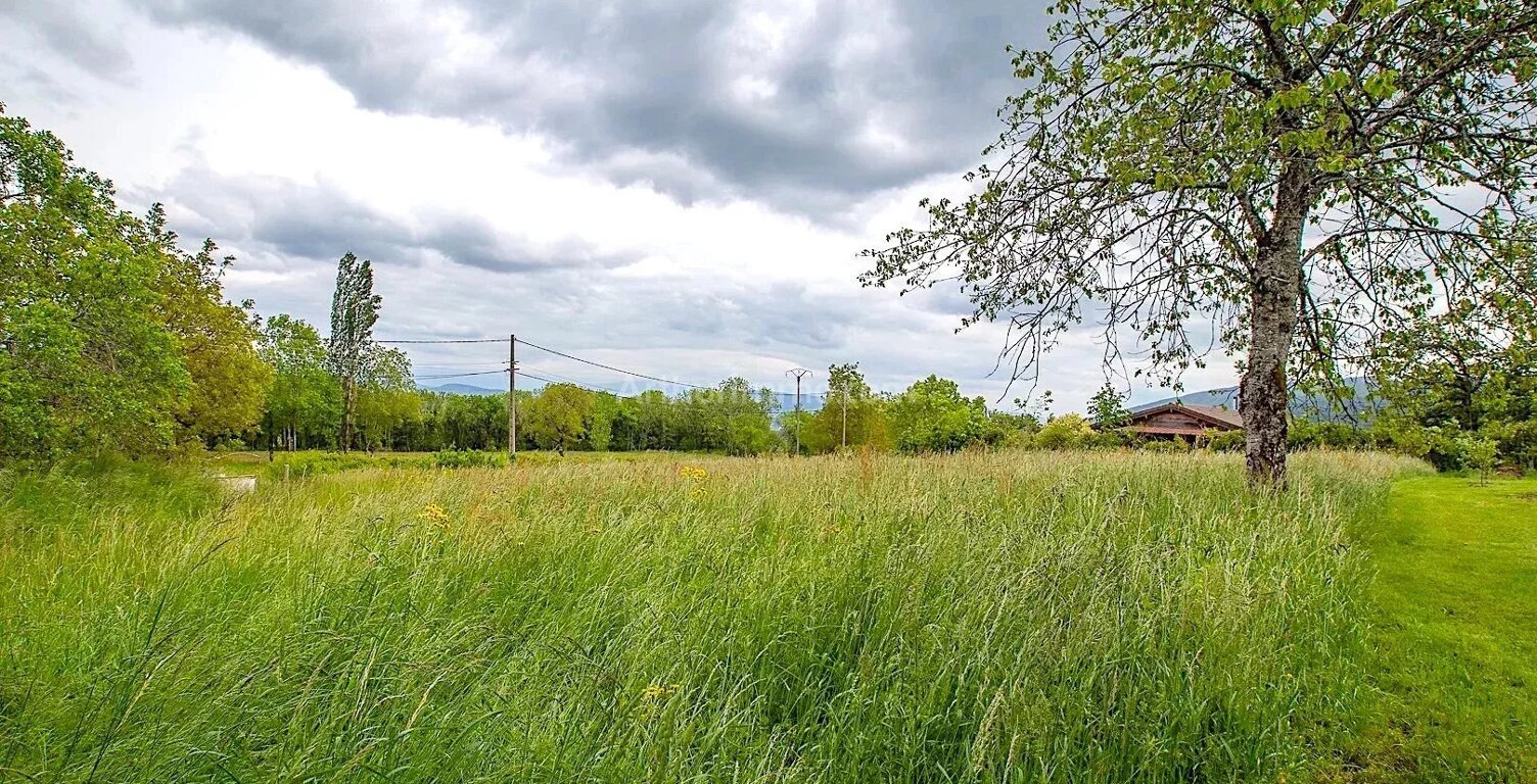 Terrain 927 m² - INJOUX-GENISSIAT — photo 1