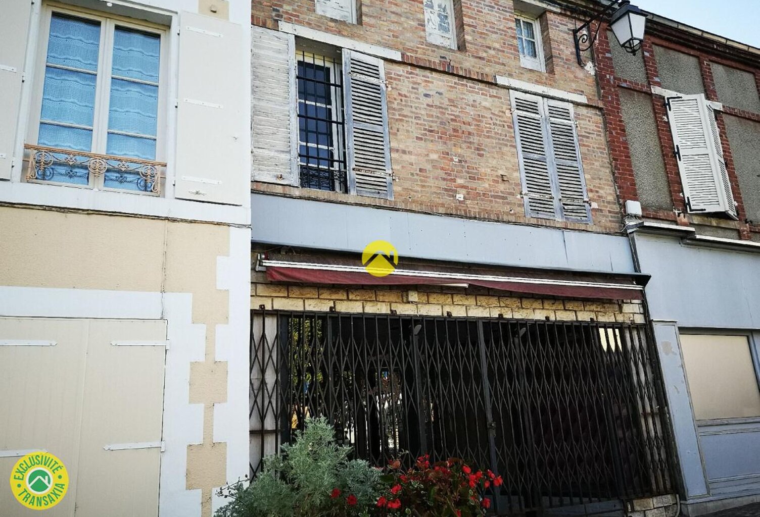Immeuble avec boutique — photo 1