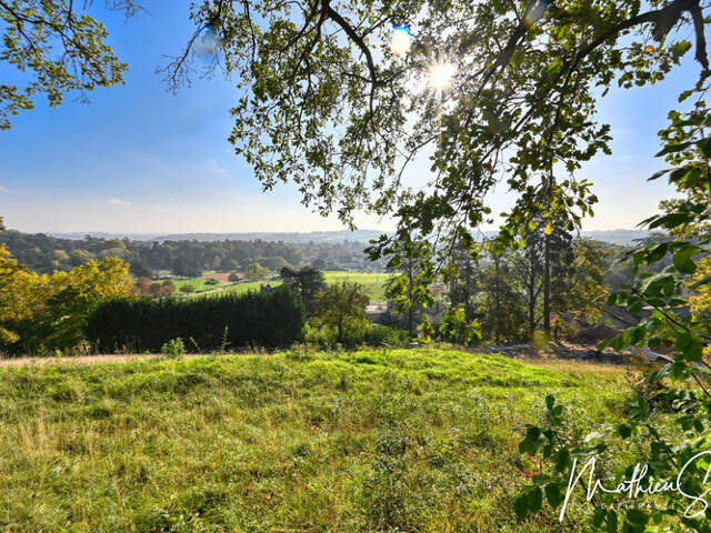 Terrain constructible de 1 200,00 m², dans un cadre calme et verdoyant — photo du bien