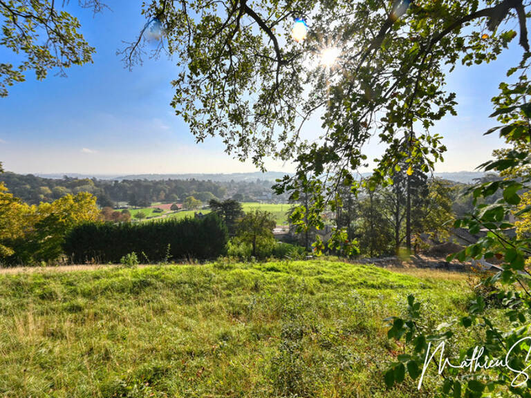 Terrain constructible de 1 200,00 m², dans un cadre calme et verdoyant — photo 1