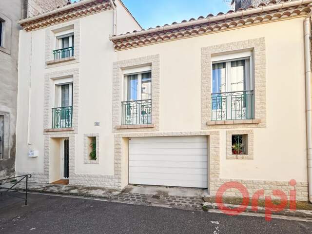À Vendre : Élégante maison de ville avec vaste garage et cour intimiste à Sérignan — photo du bien