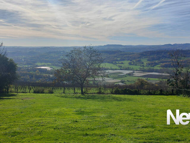 Terrain 1500 m² avec VUE à 20 mn de Brive — photo du bien