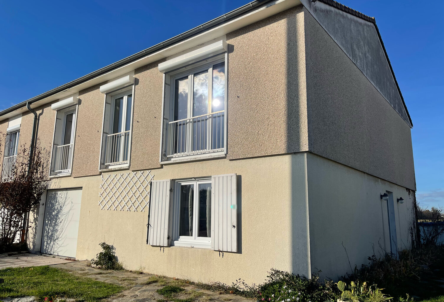 Maison 5 pièces de 123m2 avec jardin et garage - IMMOCENTER — photo 1