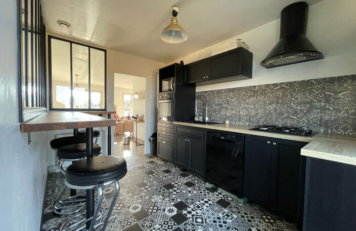Maison 5 pièces de 123m2 avec jardin et garage - IMMOCENTER — photo 2