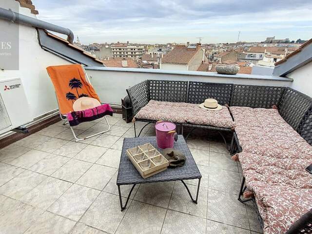 Appartement duplex style haussmannien T5 de 137.05M2 + 2 caves et terrasse et balcons- Bld Clémenceau  5 pièce(s) 135.79 m2 — photo du bien