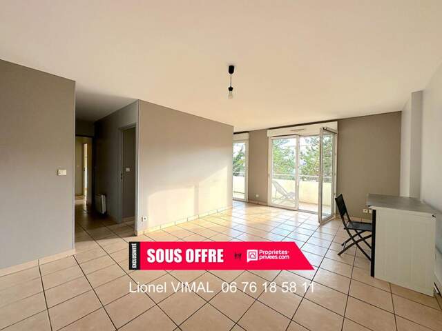 Appartement 3 pièces 61 m2 avec balcon, garage, parking et cave — photo du bien