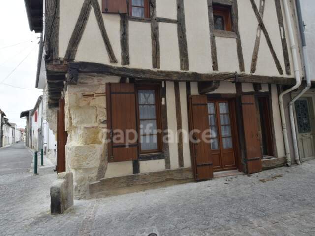 Maison de ville - colombages - pierres apparentes - 1 chambre à CASTELJALOUX (47) — photo du bien
