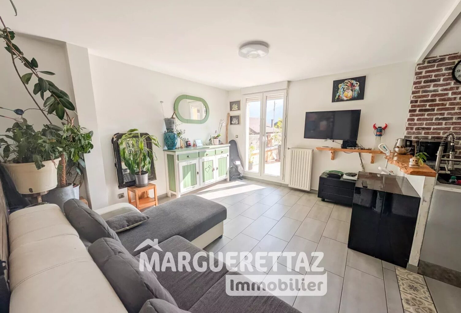 Maison T4 de 74m² MARIGNIER — photo 1