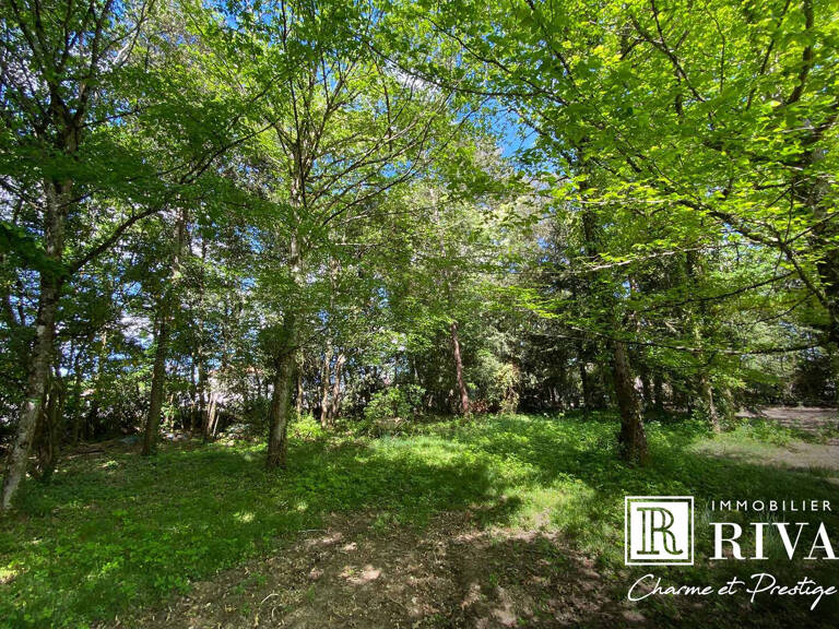 TERRAIN CONSTRUCTIBLE 1500 M2 - PROCHE ECOLES - PISCINABLE — photo 1