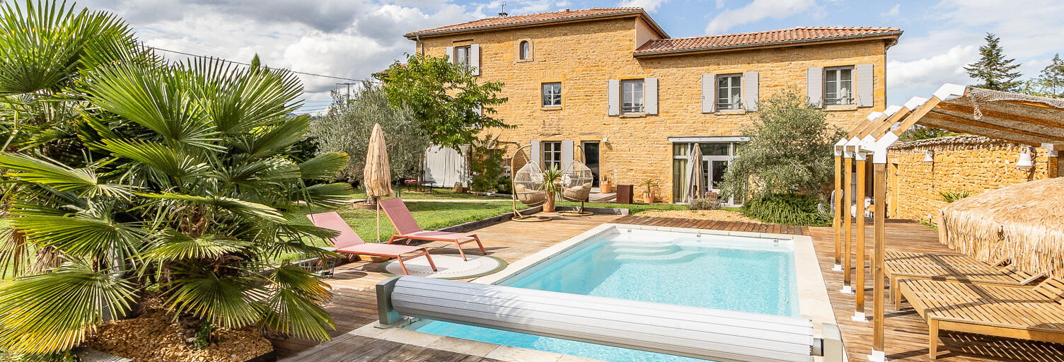 Maison 6 Pièces 223 m² à vendre à Porte des Pierres Dorées (69400)