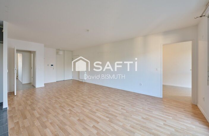 Appartement 4 pièces 3 chambres de 80 m2 avec Balcon et Place de parking au sous sol DPE "C" — photo 2